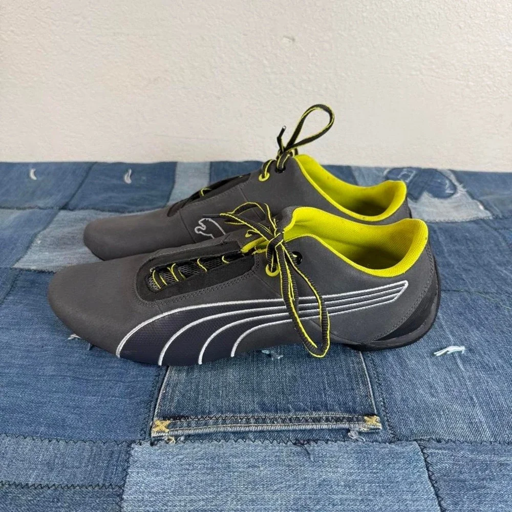 Puma black and yellow sneakers